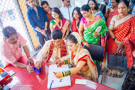 Court Marriage Couple Signing Legal Documents - Special Marriage Act