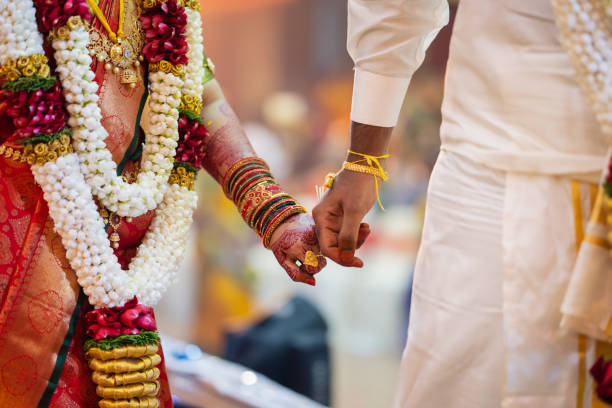 Indian Couple Holding Hands in Wedding Ceremony - Court Marriage